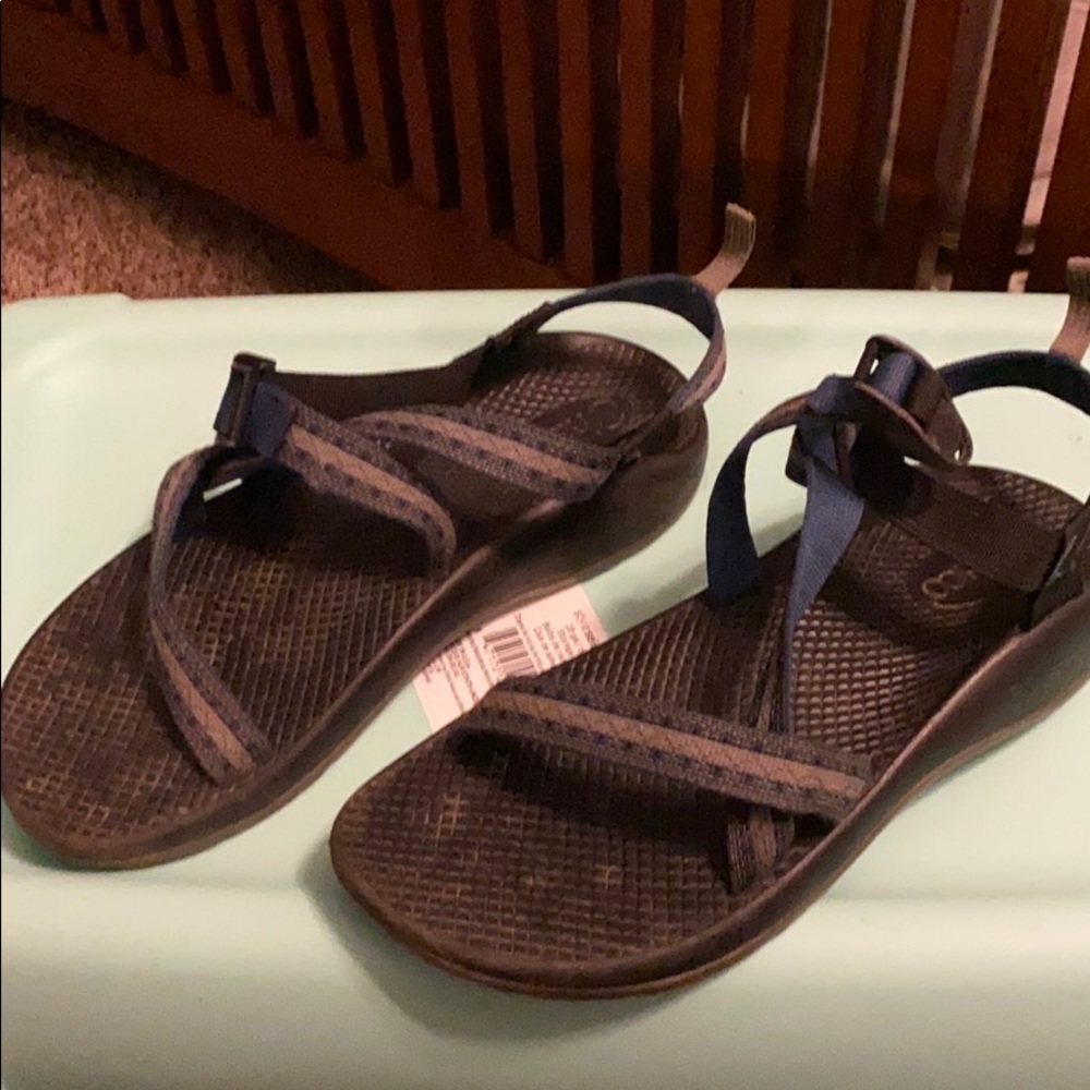 Boys size 6 chacos lots of wear left.